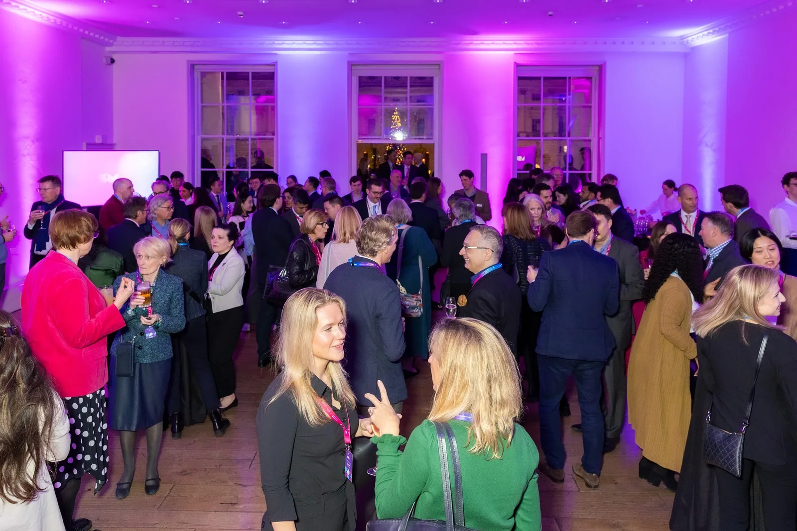 Guests talking at the opening reception